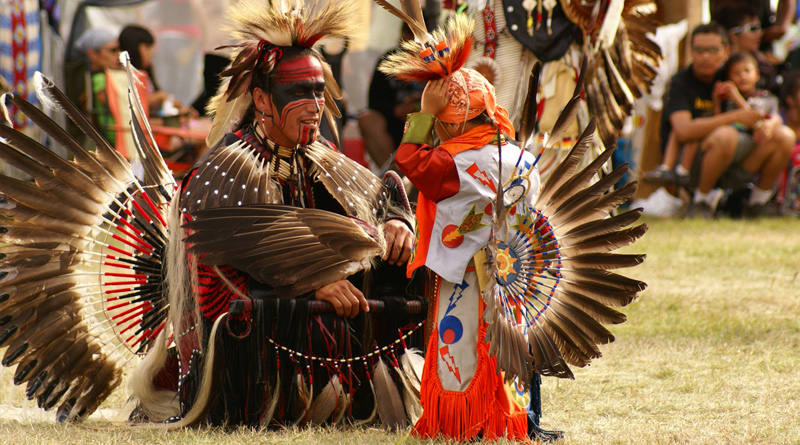 Atikamekw in dance clothes at the powwow site in Manawan, Quebec, Canada.